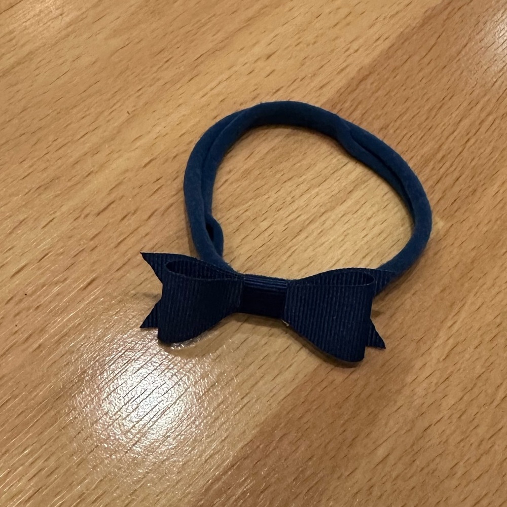 Pretty little dark blue newborn bow